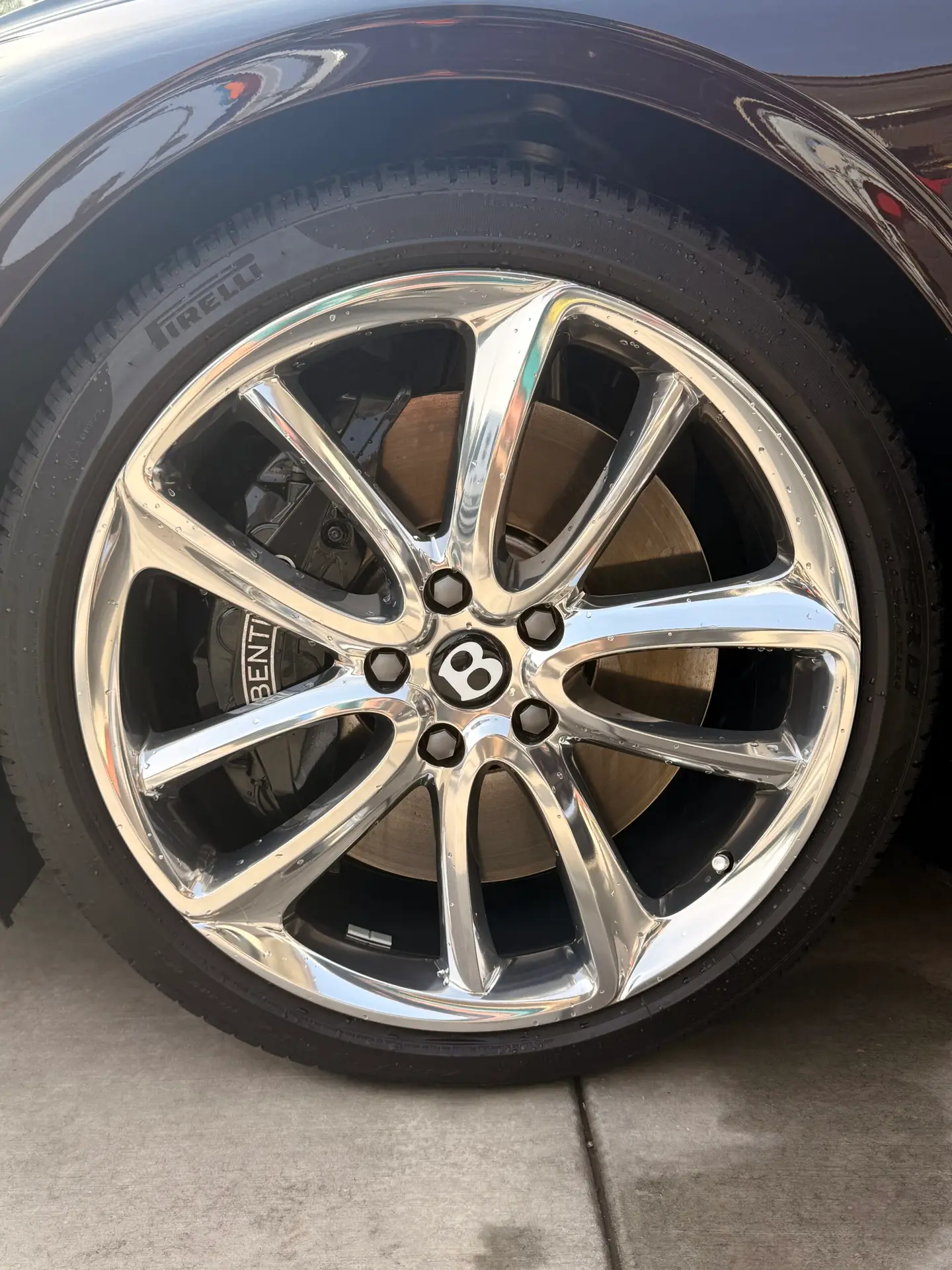 Bentley wheel after professional rim detailing and polishing in Riverside California